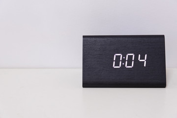 Black digital clock on a white background showing time 0:04