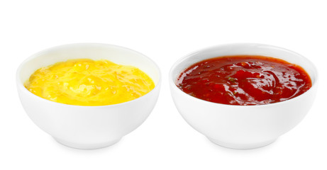 Tasty sauces in bowls on white background