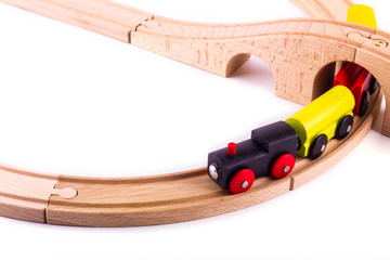 Colorful wooden toy train, isolated on white background