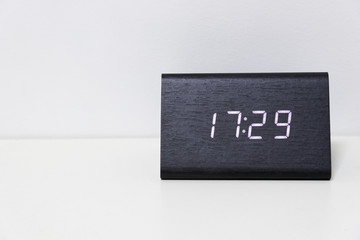 Black digital clock on a white background showing time 17:29