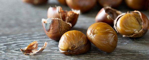 The Chestnut roasted and put on the wooden background