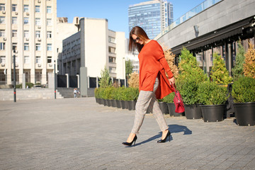 Fashionable young woman outdoors