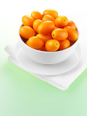 KUMQUATS IN BOWL