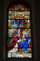 Colorful stained window of an historical church