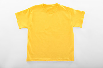 Blank yellow t-shirt on white background © Pixel-Shot