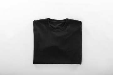Blank black t-shirt on white background