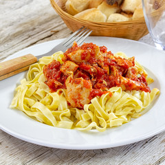 chicken, pasta with tomato sauce