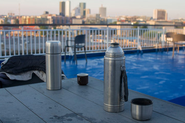 Fototapeta premium two thermos on the table