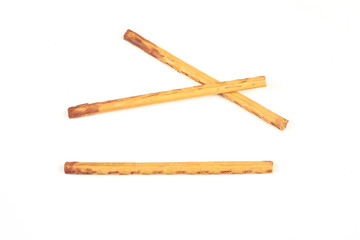 biscuit sticks with sweet filling on white background.