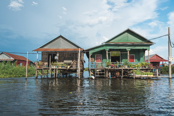 Fototapeta na wymiar life in a floating villages in a big lake