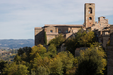 Medieval hamlet. Landscape with medieval hamlet on the hill, with Church and its bell tower