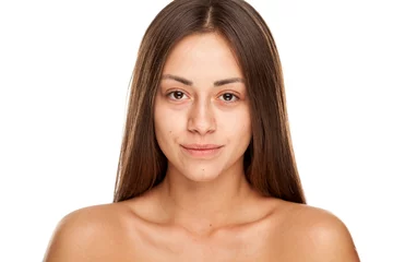 Poster Portrait of young beautiful woman with no makeup on white background © vladimirfloyd