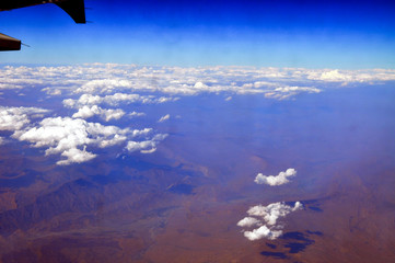An areal view of the clouds and mountains 