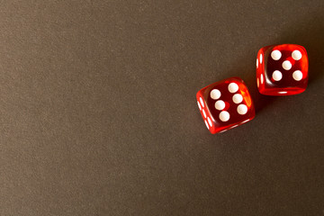 Dice on a black background . Game concept. Games of chance.