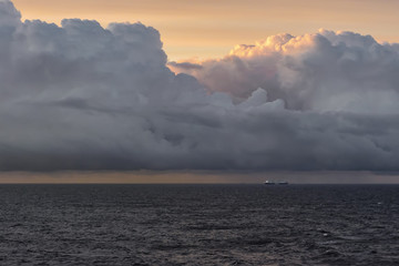 Naklejka na ściany i meble Huge rain cloud in the Baltic Sea