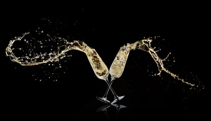 Goblets with champagne wine splashing out © Jag_cz