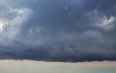 sky is covered with black storm clouds. Scary sky