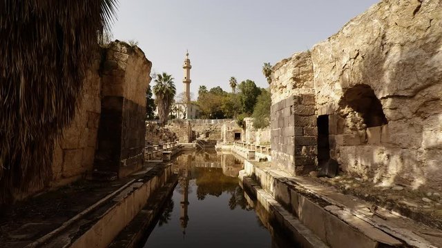 Ruins of Roman baths hot springs spa in Hamat Gader in the South of Golan Heights, view to north