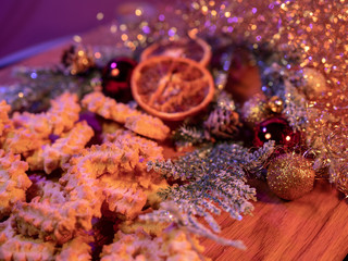 Spritz biscuits Christmas cookies on a decorated table