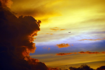 golden sunset with airplane
