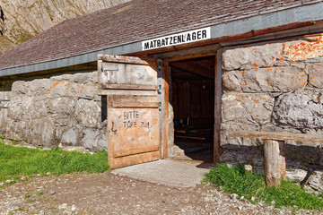 Fototapeta na wymiar Entrance to emergency shelter at Fählenalp (Faehlenalp) by Fällensee (Faellen Lake) - Alpstein, Appenzell Alps, Switzerland
