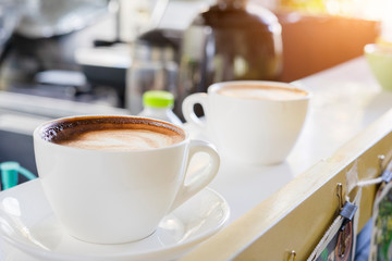 cup of coffee on table in cafe ,Morning light