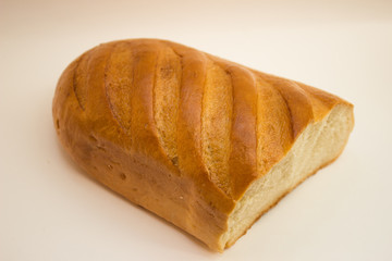 half delicious soft bread on white background