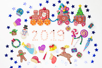Merry Christmas greeting card with decorations. Santa, Christmas train with tree and sweets, snowman, reindeer and gifts