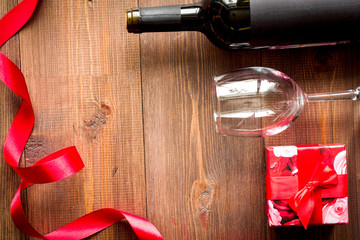 concept Valentine Day with wine at wooden background top view