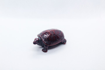 Turtle figurine isolated on white background
