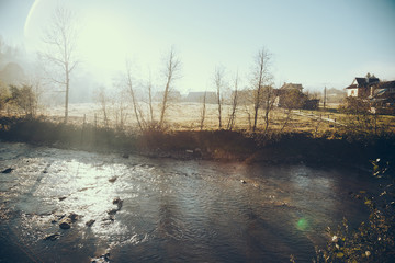 Obraz premium scenic shot of river in Vorokhta town on sunny morning, Carpathians, Ukraine