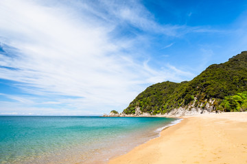 Fototapeta na wymiar A beautiful beach along the coastline in Abel Tasman National Park, South Island, New Zealand.