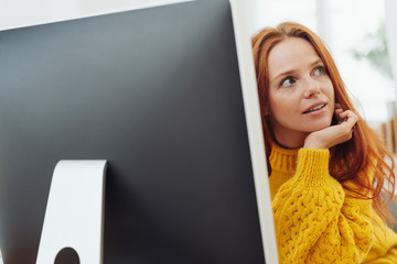 Businesswoman listening and watching attentively