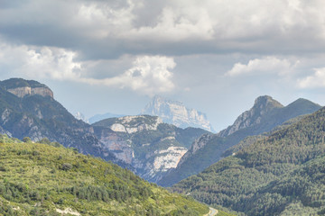 Fototapeta na wymiar The Peña Montañesa range during a summer cloudy day in the Aragon Pyrenees mountains, Spain
