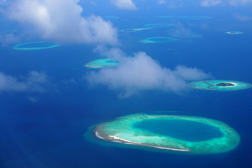 Naklejka na ściany i meble Maldives islands, sky and deep blue ocean