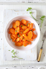 Vegetarian cuisine. Stewed carrots and fresh parsley