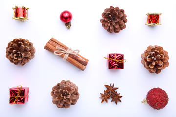 Christmas composition with pine cones and christmas decoration on white background