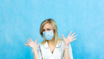 A nurse put gloves on her hands to massage the prostate in men.  Doctor proctologist with gloves...