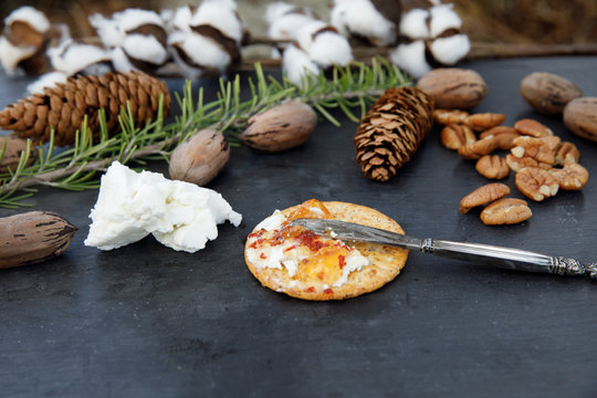 Rustic Cheese Tray with Crackers, Pecans, Herbs and Cracker