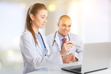 Fototapeta premium Doctors team talking expertise in hospital by