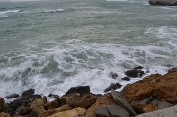 Fototapeta na wymiar Sea rocks sand waves