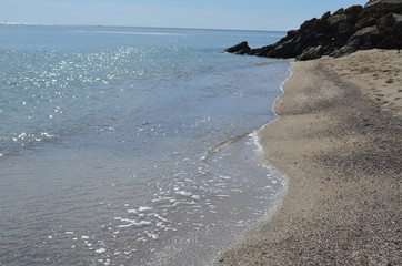 Sea rocks sand waves