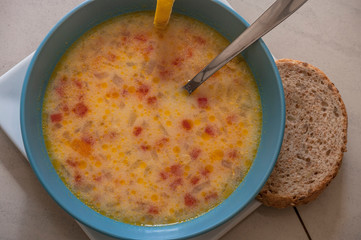Homemade hot vegetable soup in bowl, close-up