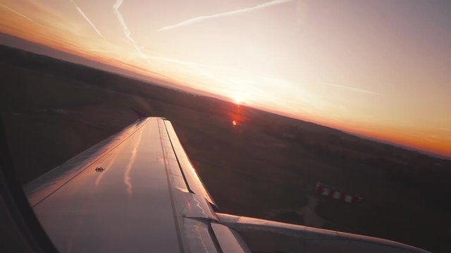 Plain Lift Off at Sunrise, Passenger POV View Through Window
