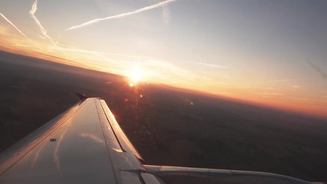Airliner Climbing, Gaining Altitude, POV Passanger View, Sunrise
