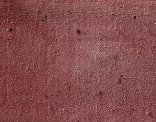 Old wall painted with pink paint as a background