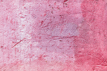 Old wall painted with pink paint as a background