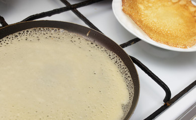 Pancakes from dough fried in a pan