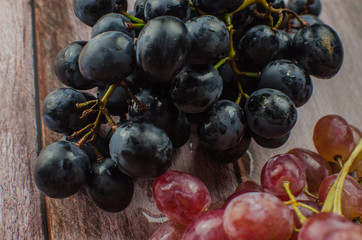 Blue grapes with green leaf healthy eating, isolated