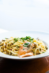 tasty pasta with salmon on a the table
